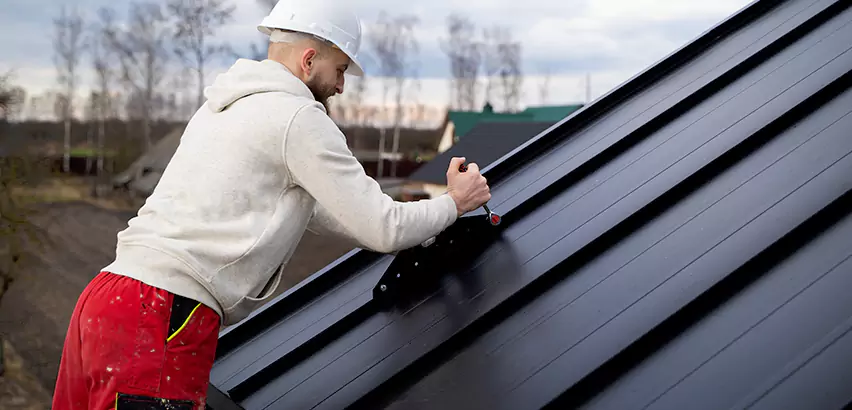 Tin Roof Ridge Cap Installation in Bothell